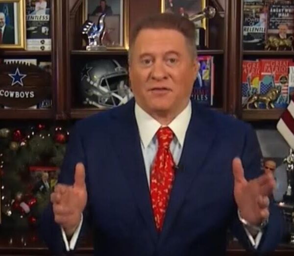 Wayne Root on a TV set speaking