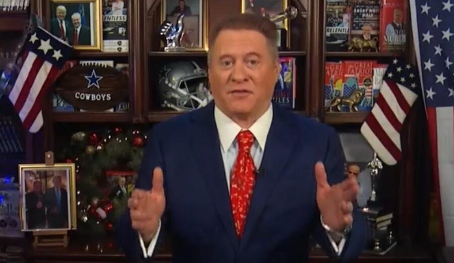 Wayne Root on a TV set speaking