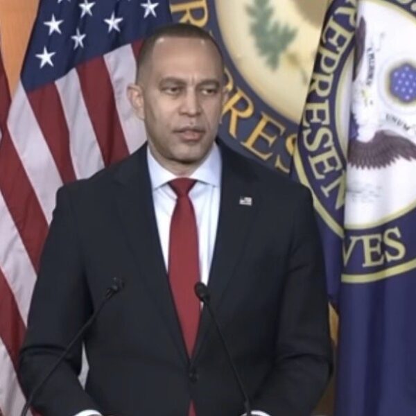 Hakeem Jeffries speaking at a podium on Capitol Hill