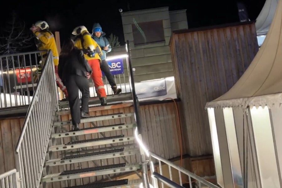 Crowd evacuated outside Davos Congress Center at night