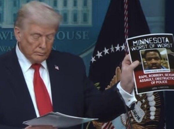 Crowd outside a church with protesters and reporters