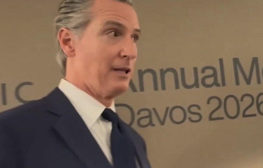 Gavin Newsom speaking at Davos with reporters