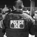 Exterior of police vehicle and assisted living parking lot where arrest took place