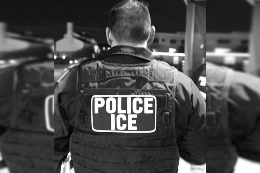 Exterior of police vehicle and assisted living parking lot where arrest took place